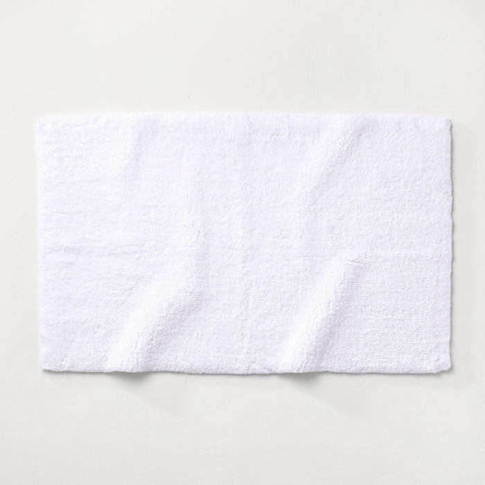 21"x34" Ultra Soft Tufted Bath Rug White - Casaluna