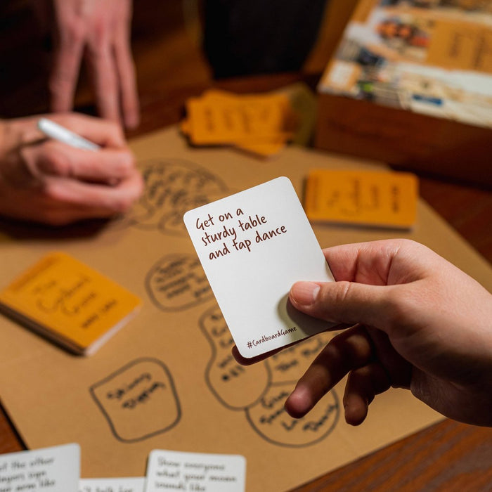 Dude With Sign's The Cardboard Game by What Do You Meme?