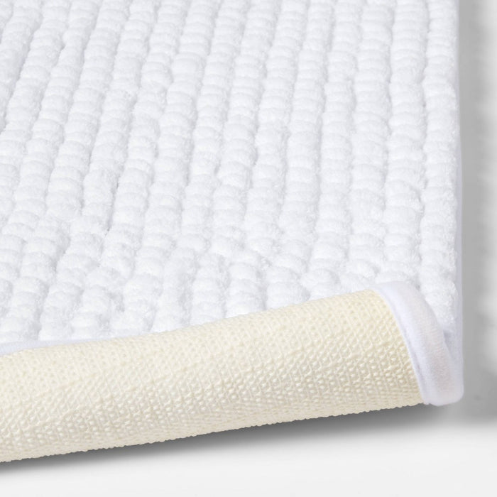 17"x24" Chunky Chenille Memory Foam Bath Rug White - Room Essentials™
