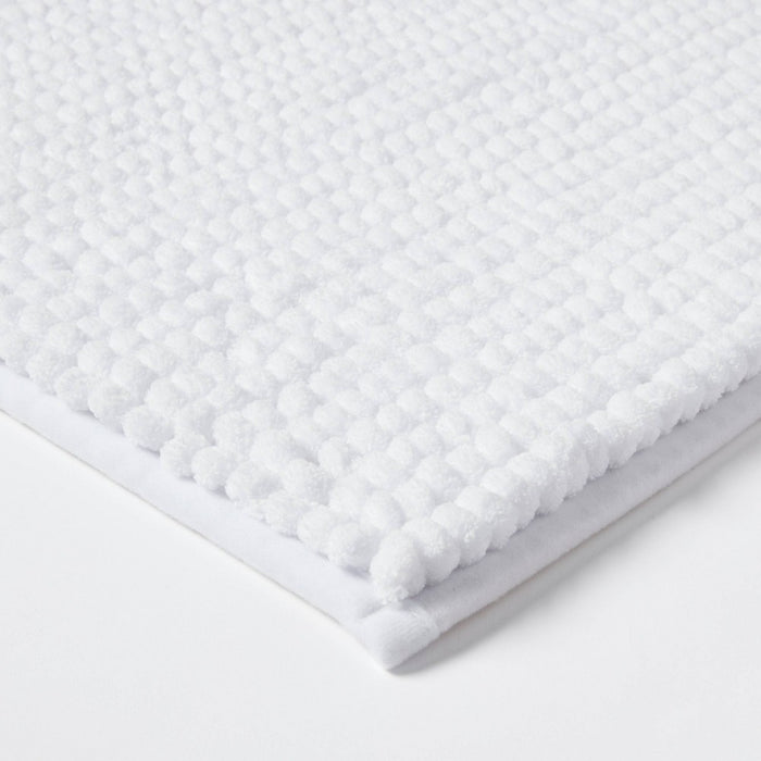 17"x24" Chunky Chenille Memory Foam Bath Rug White - Room Essentials™