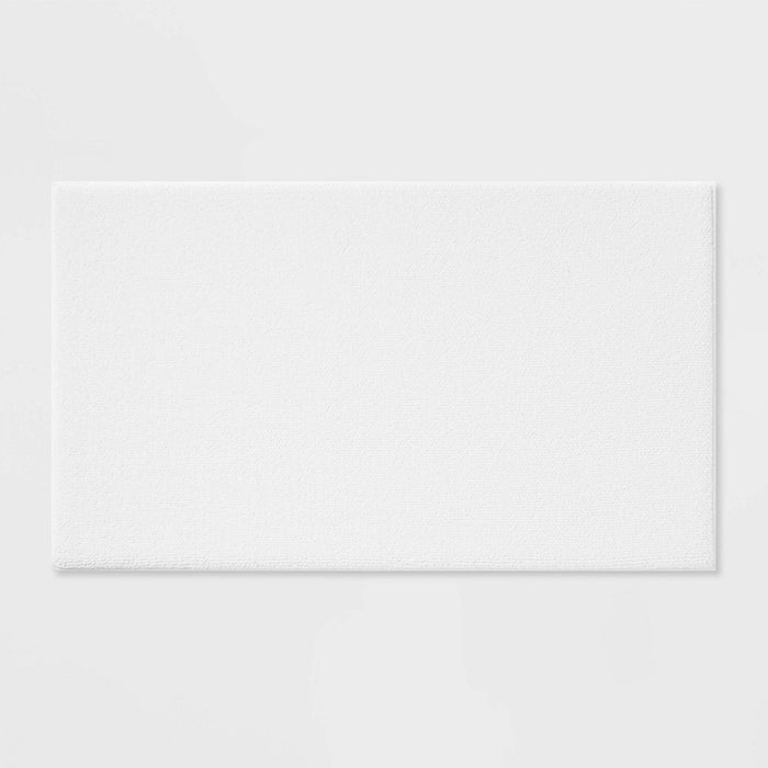20"x34" Fine Chenille Memory Foam Bath Rug White - Threshold™