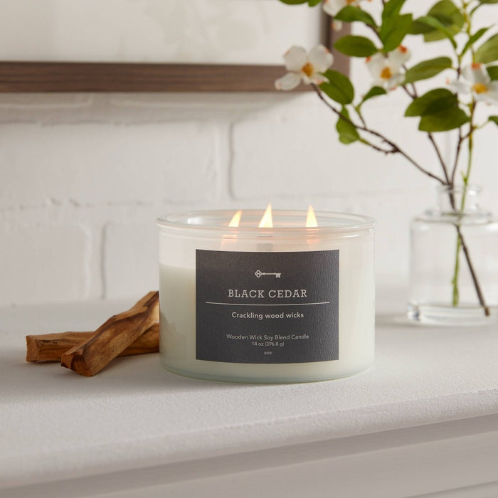 14oz 3-Wicks Milky White Glass Woodwick Candle with Wood Lid and Stamped Logo Black Cedar - Threshold