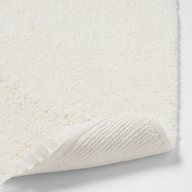 18"x32" Plush Half Moon Bath Rug Cream - Threshold
