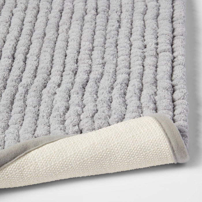17"x24" Chunky Chenille Memory Foam Bath Rug Light Gray - Room Essentials