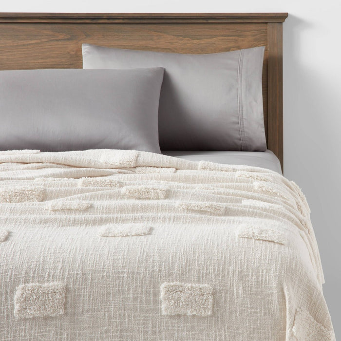 60"x80" Global Tufted Throw Blanket with Tassels Ivory - Threshold