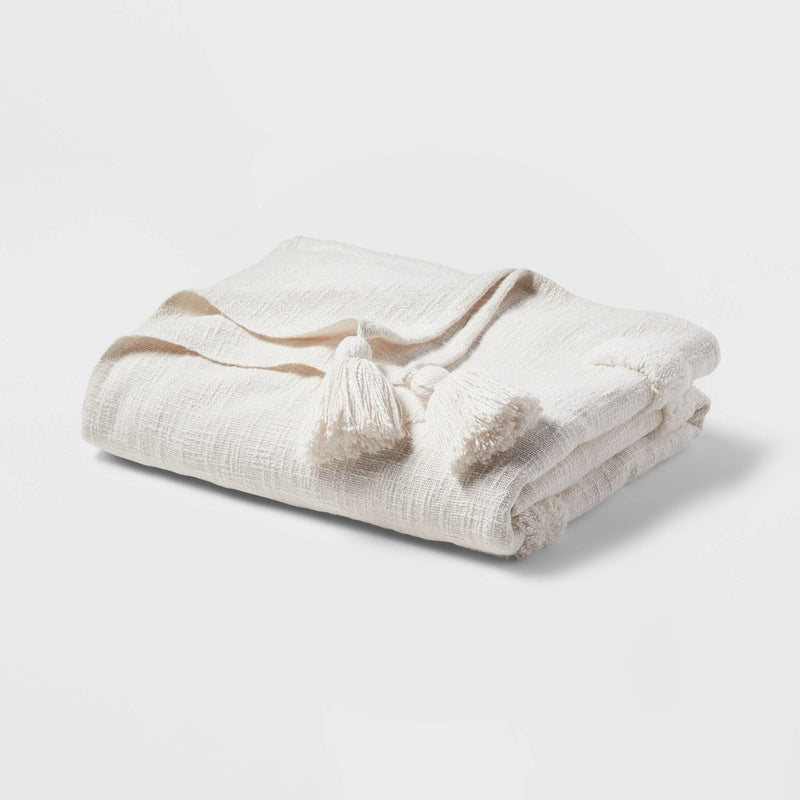 60"x80" Global Tufted Throw Blanket with Tassels Ivory - Threshold