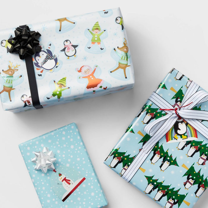 25 sq ft Penguins with Tree Gift Wrap Light Blue - Wondershop