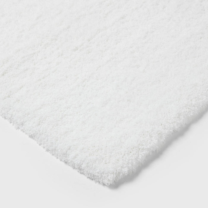 24"x40" Spa Plush Bath Rug White - Threshold