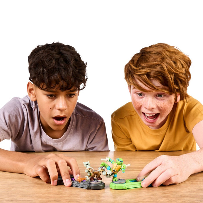 Akedo Teenage Mutant Ninja Turtles Michelangelo vs Bebop Mini Figure Set - 2pk