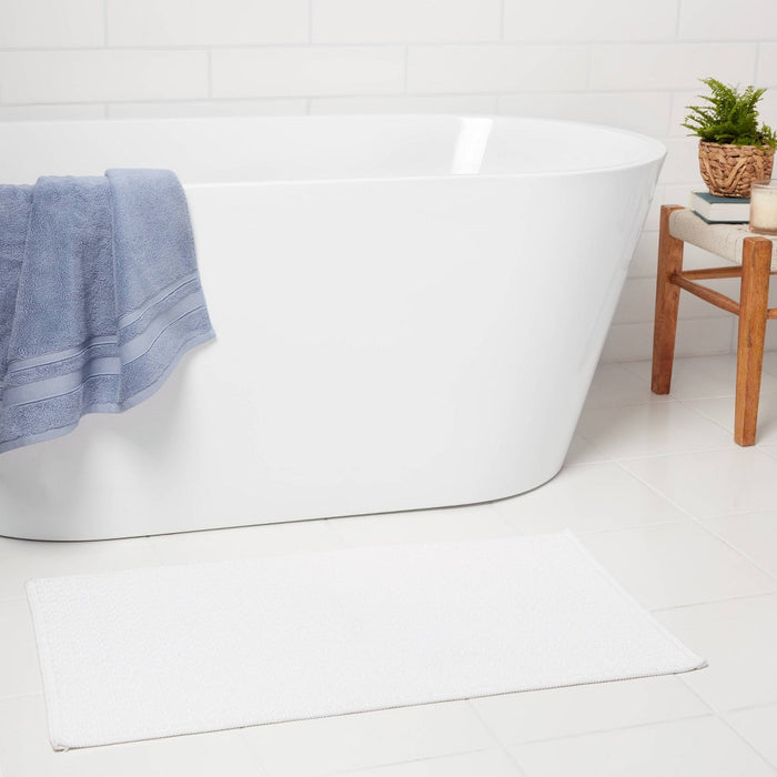 20"x34" Antimicrobial Bath Mat White - Threshold