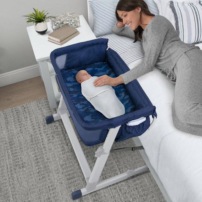 babyGap by Delta Children Whisper Bedside Bassinet Sleeper with Breathable Mesh and Adjustable Heights - Navy Camo (LOCAL PICKUP ONLY)