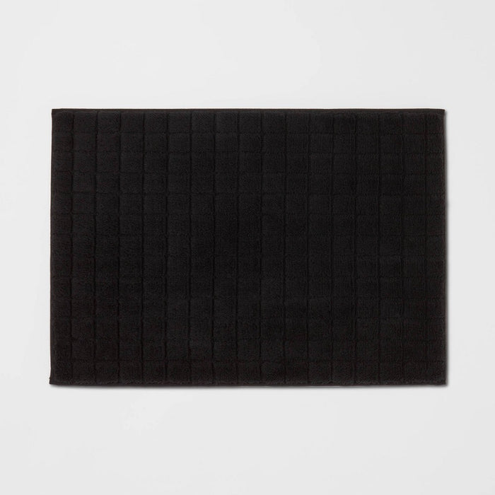 17"x24" Velveteen Grid Memory Foam Bath Rug Black - Room Essentials