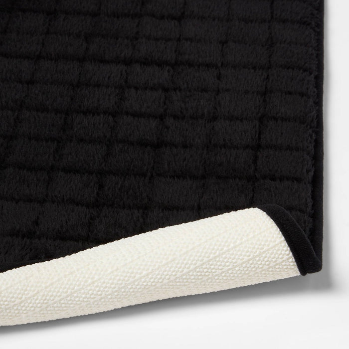 17"x24" Velveteen Grid Memory Foam Bath Rug Black - Room Essentials