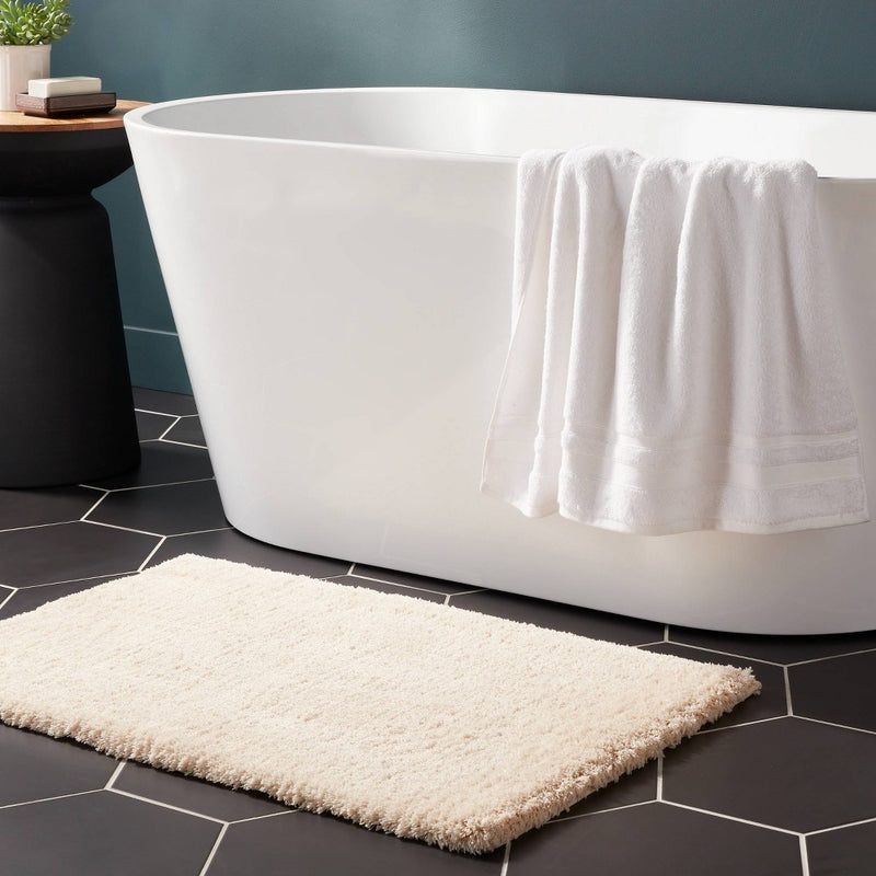 21"x34" Spa Plush Bath Rug Almond - Threshold