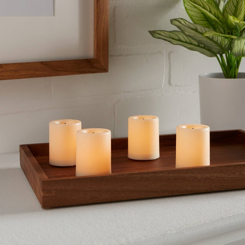 1.82" x 1.4" 4pk LED Votive Flameless Black Wick Candle Cream - Threshold
