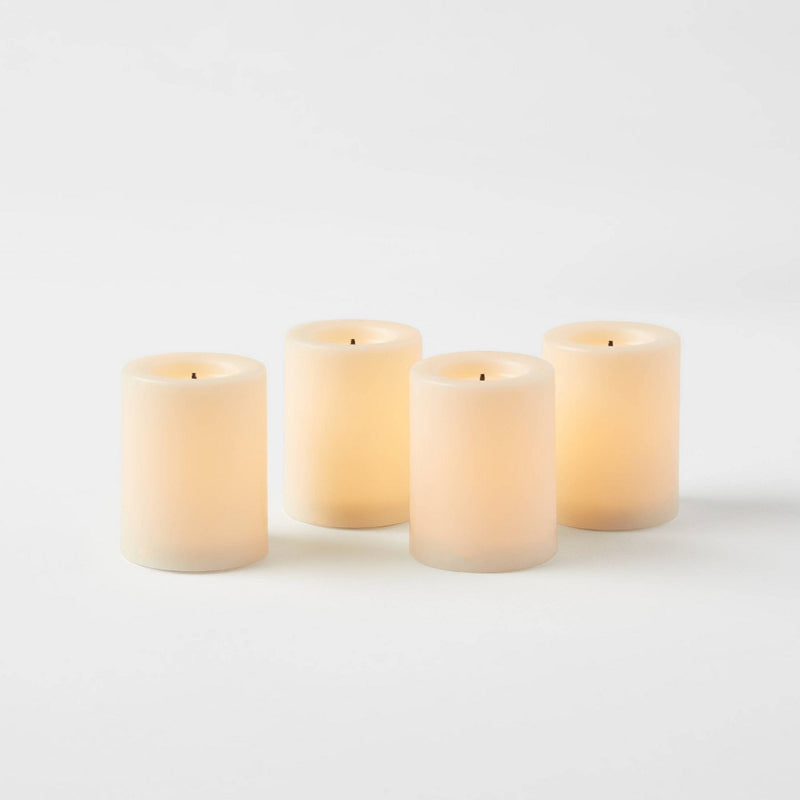1.82" x 1.4" 4pk LED Votive Flameless Black Wick Candle Cream - Threshold