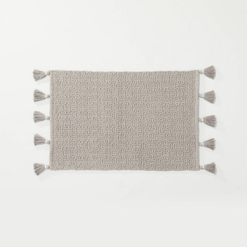 20" x 32" Solid Tassels Bath Rug Gray - Hearth & Hand with Magnolia