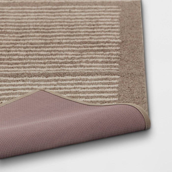 2'6"x4' Washable Knitted Stripe Accent Rug Tan - Threshold