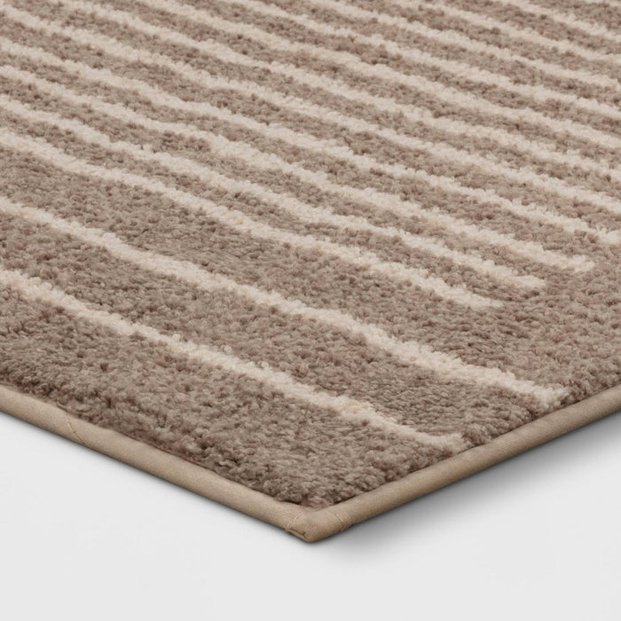 2'6"x4' Washable Knitted Stripe Accent Rug Tan - Threshold
