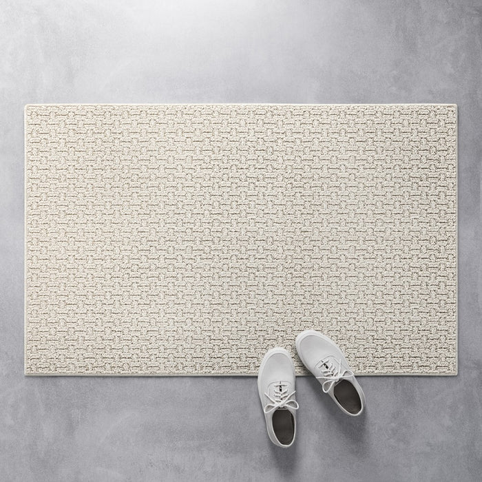 2'6"x3'10" Washable Solid Machine Tufted Accent Rug Tan - Threshold