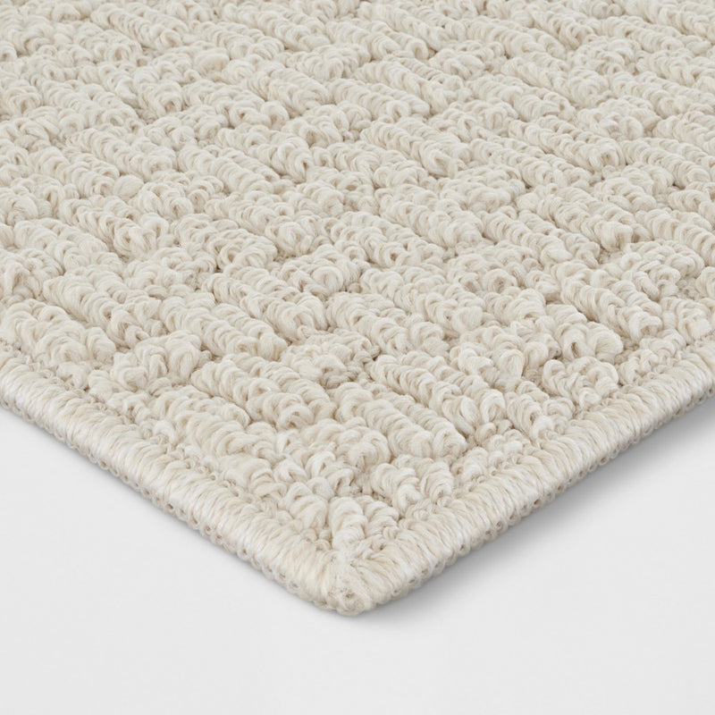 2'6"x3'10" Washable Solid Machine Tufted Accent Rug Tan - Threshold