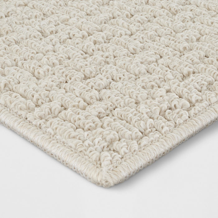 2'6"x3'10" Washable Solid Machine Tufted Accent Rug Tan - Threshold
