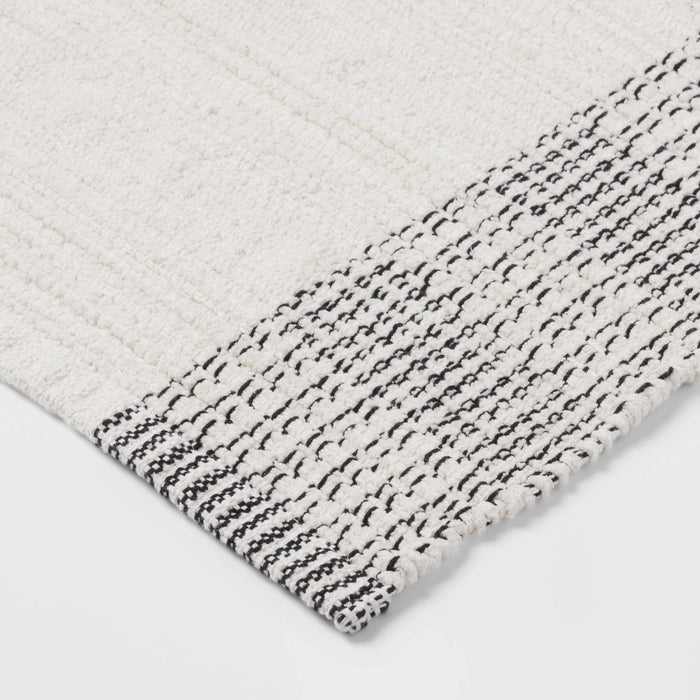 24"x36" Oversized Modern Chenille Bath Rug Black/White - Threshold