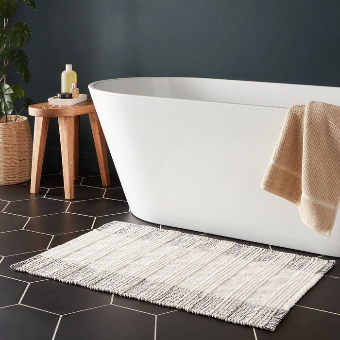24"x36" Oversized Modern Chenille Bath Rug Black/White - Threshold
