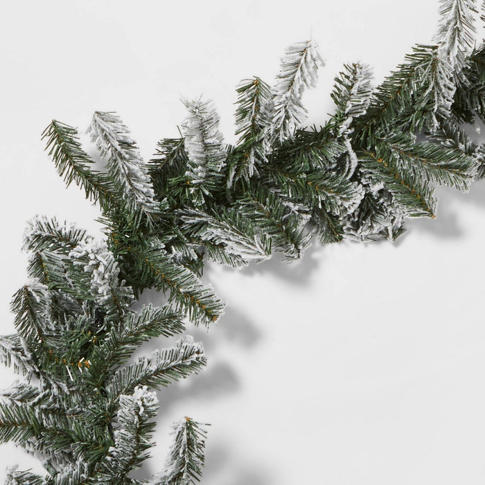 9' Pre-Lit Flocked Artificial Pine Christmas Garland Green with Clear Lights - Wondershop