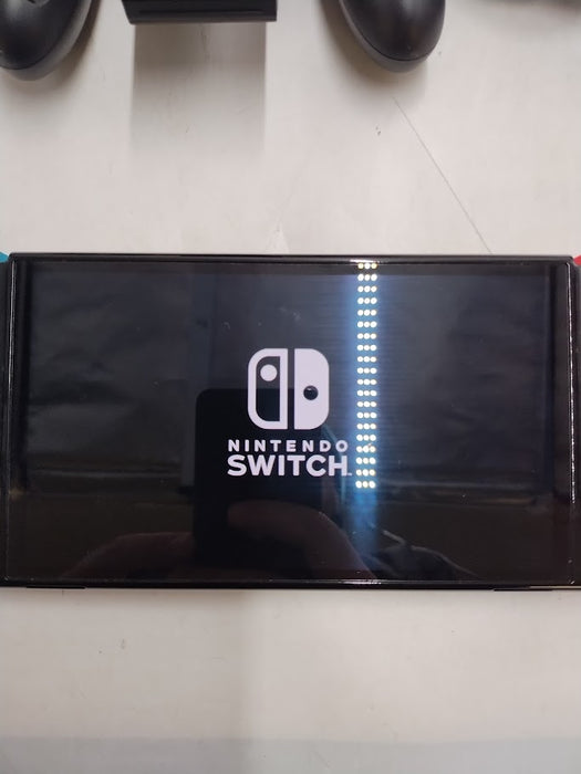 Nintendo Switch - OLED Model with Neon Red & Neon Blue Joy-Con SEE DETAILS