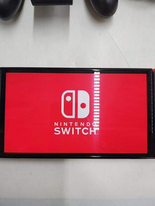 Nintendo Switch - OLED Model with Neon Red & Neon Blue Joy-Con SEE DETAILS