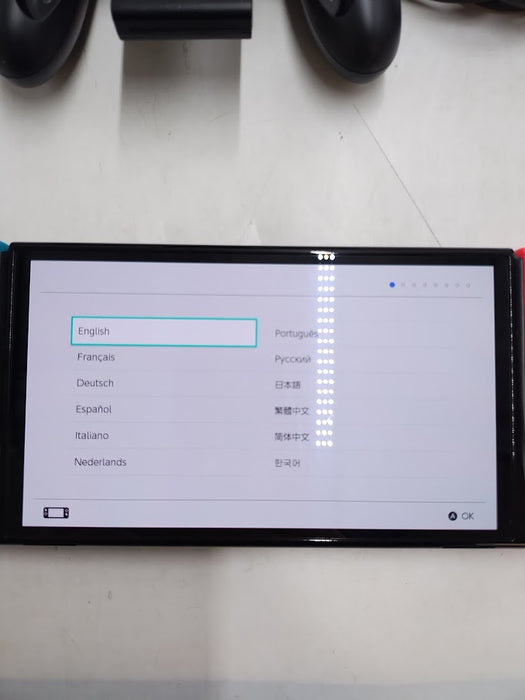 Nintendo Switch - OLED Model with Neon Red & Neon Blue Joy-Con SEE DETAILS
