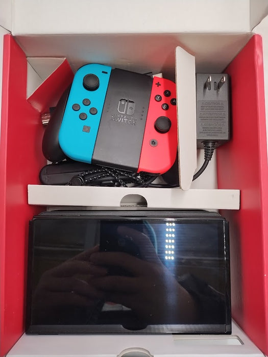Nintendo Switch - OLED Model with Neon Red & Neon Blue Joy-Con SEE DETAILS