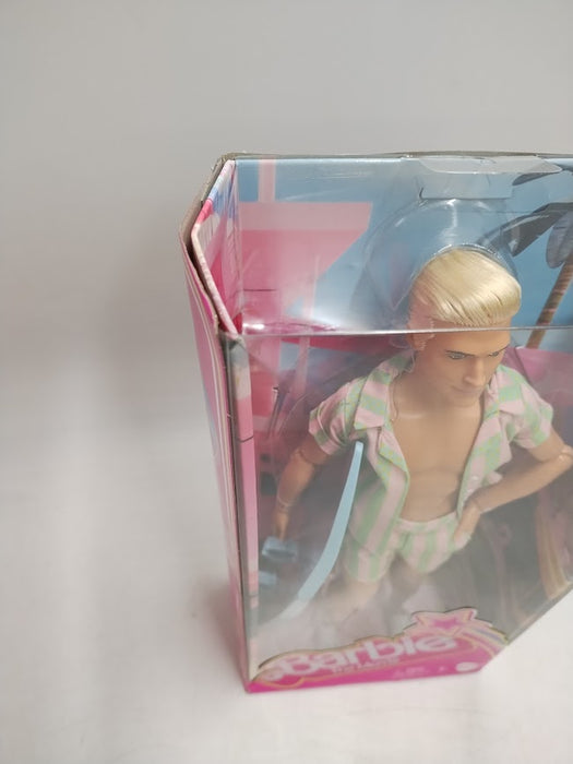 Barbie: The Movie Ken Doll Wearing Pastel Striped Beach Matching Set SEE DETAILS