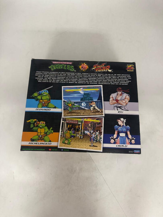Playmates- MNT vs. Street Fighter - Michelangelo vs. Chun-Li 2pk SEE DETAILS