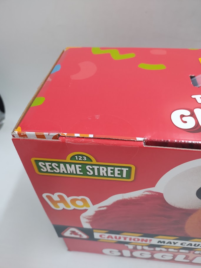 Sesame Street Tickle Me Elmo Giggle Max Interactive Plush Toy SEE DETAILS