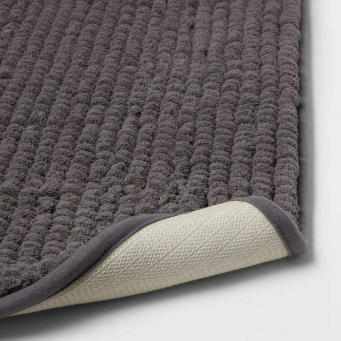 17"x24" Chunky Chenille Memory Foam Bath Rug Dark Gray - Room Essentials