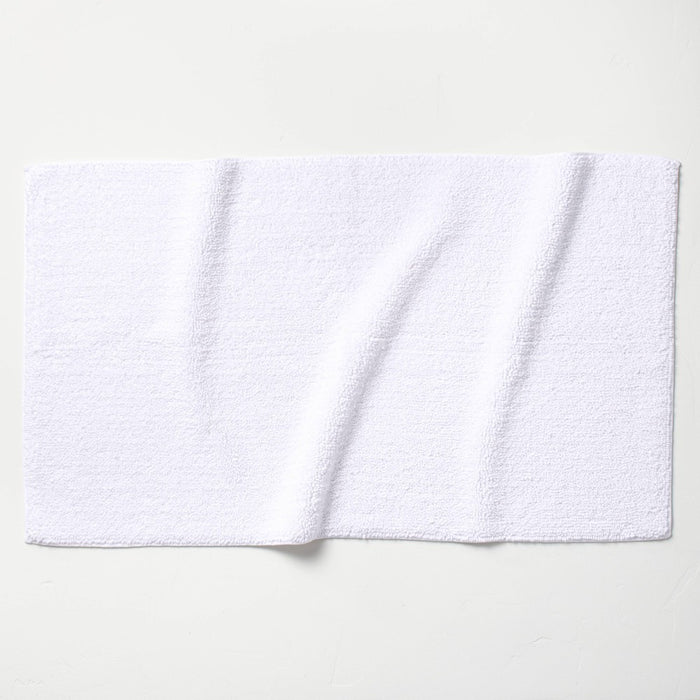 24"x40" Looped Bath Rug White - Casaluna