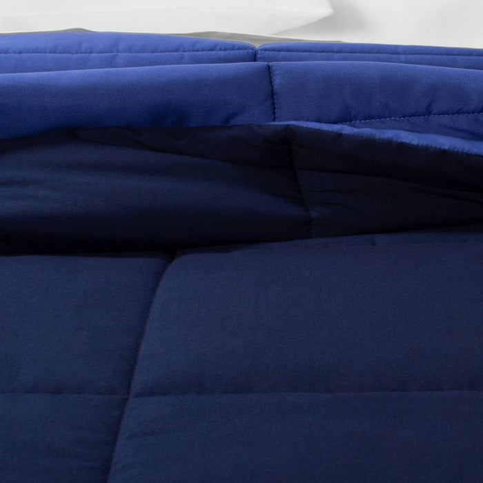 Full/Queen Reversible Microfiber Solid Comforter Navy/Blue - Room Essentials