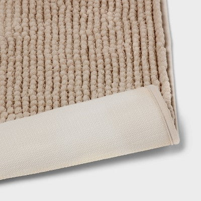 20"x34" Low Chenille Memory Foam Bath Rug Tan - Threshold