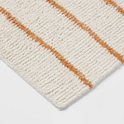 20"x30" Modern Tufted Stripe Bath Rug Yellow/Cream - Threshold