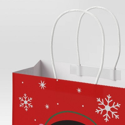 Cub Penguin with Earmuffs and Scarf Paper Handle Christmas Gift Bag Red/Black/White - Wondershop