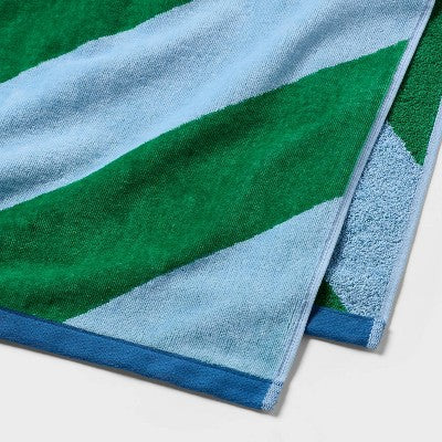 36"x72" Reversible Diagonal Striped Oversized Beach Towel Blue/Green - Room Essentials