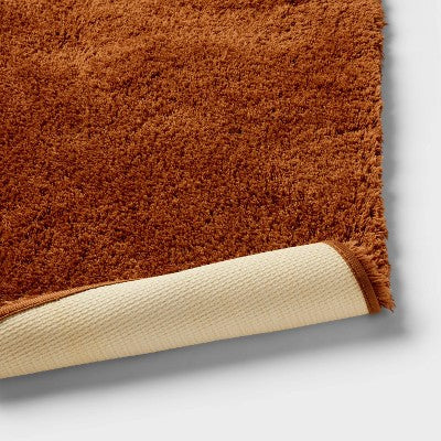 24"x40" Spa Plush Bath Rug Caramel - Threshold