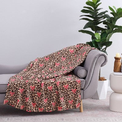 Kelly Leopard with Bows Throw Blanket Pink