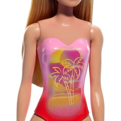 Barbie 12.7" Beach Doll Blond Hair/Blue Eyes Wearing Pink Palm Tree Print Swimsuit