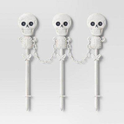 49" Skeletons Fence Stakes Halloween Decorative Prop Off-White - Hyde and EEK! Boutique (LOCAL PICKUP ONLY)