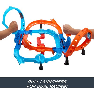 Hot Wheels Ultra Hots Blast Launch Face-Off Track Set with 2 1:64 Scale Toy Cars