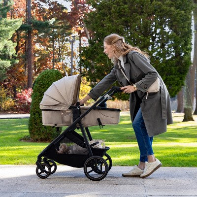 Evenflo Shyft Intuiti+ Travel System Featuring Revolve180 LiteMax NXT with Sensory Soothe - Travertine (LOCAL PICKUP ONLY)