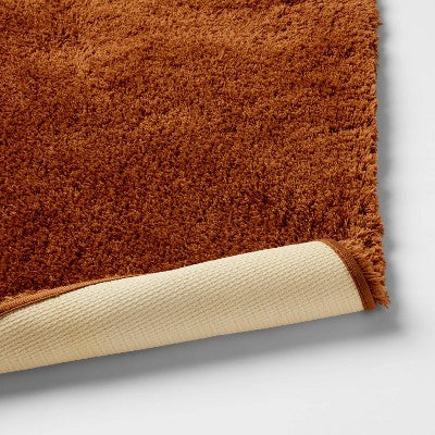21"x34" Spa Plush Bath Rug Caramel - Threshold